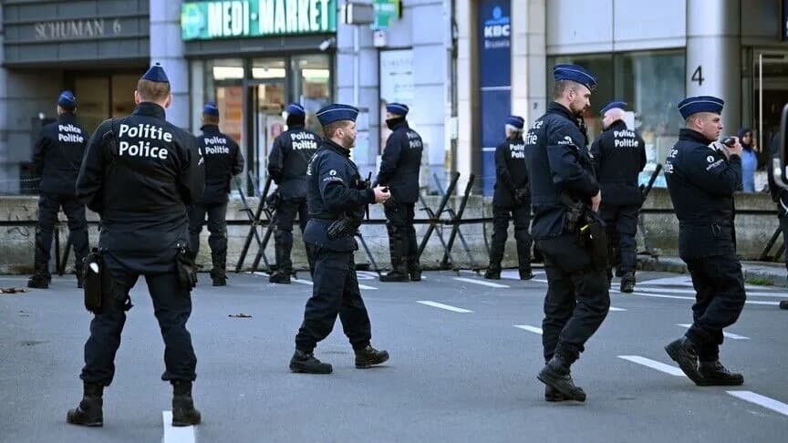 Belgian police officers patrolling a Brussels street