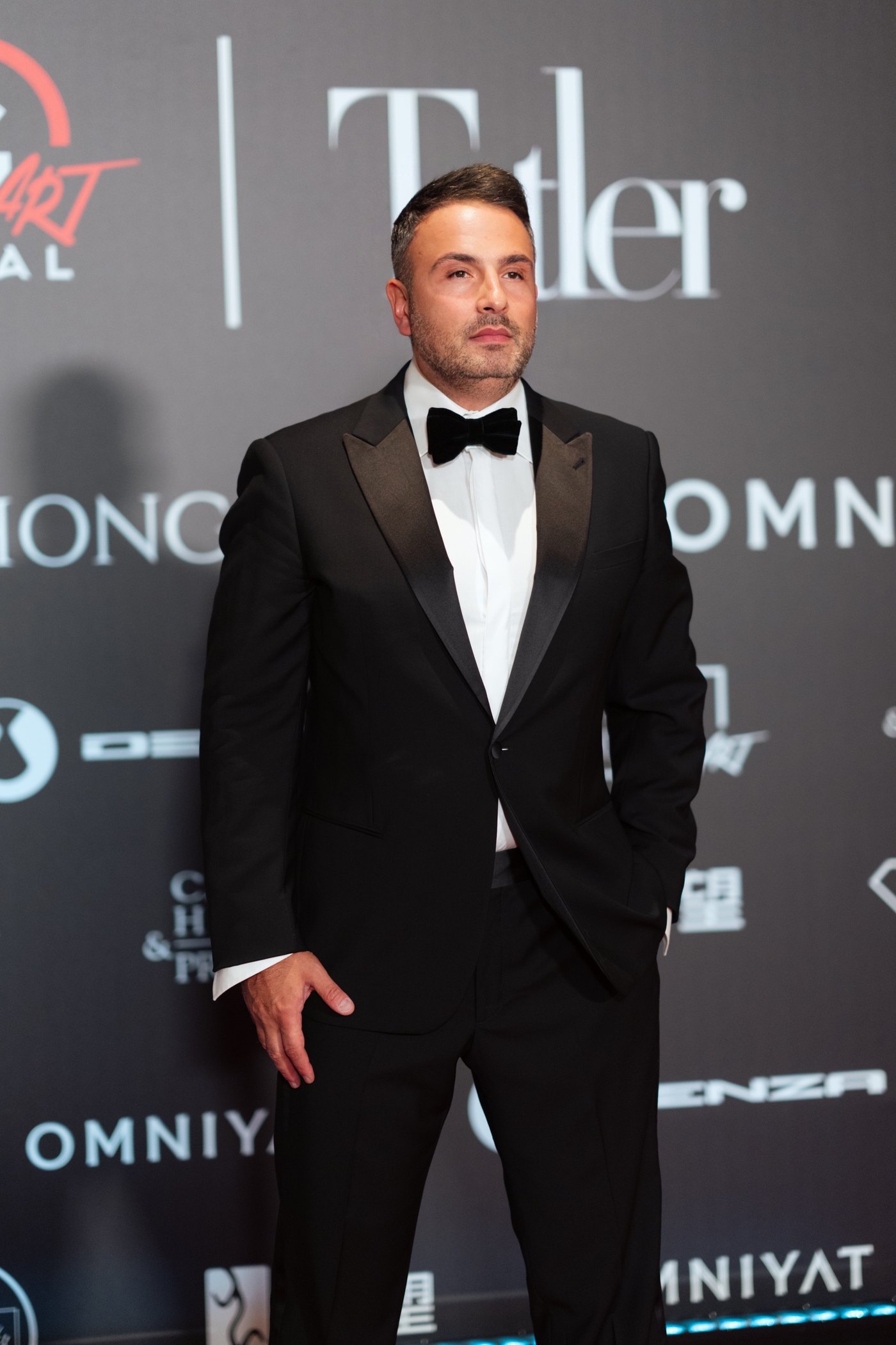 Maxim Berin at a gala evening step and repeat